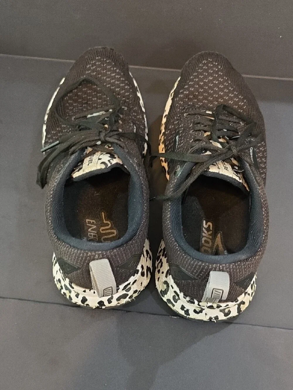 Brooks Revel 4 Women's Black Knit Shoes with Leopard-Print Midsole Size 8.5